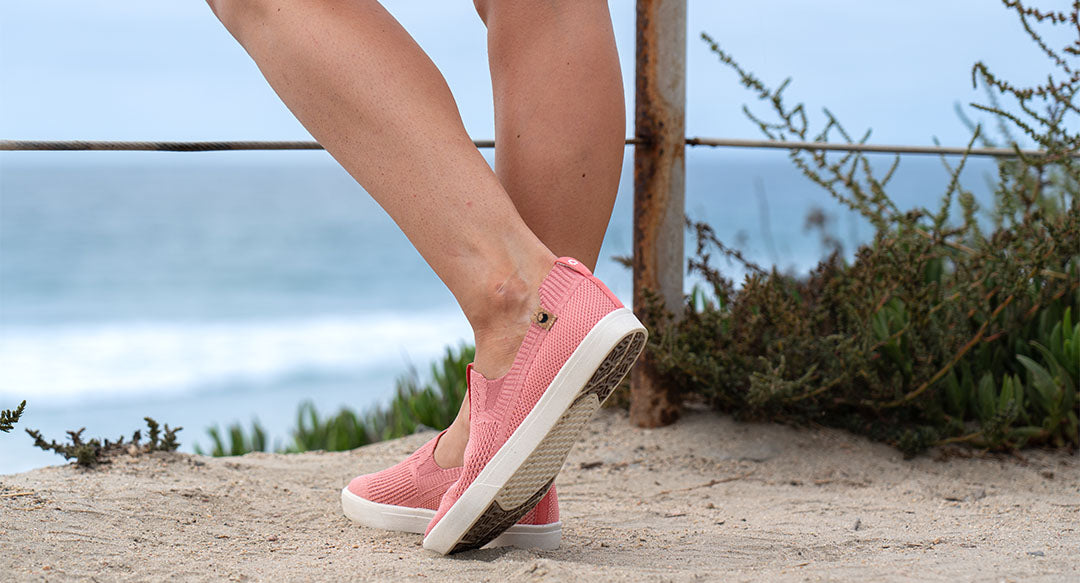 Chaussures femme de couleur rose portées et vue de derrière